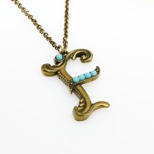 Кулон з латуні Michal Negrin у вигляді букви F з кристалами Swarovski 55450F фото