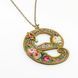 Кулон з латуні Michal Negrin у вигляді літери "e" з кристалами Swarovski 13510e фото 1
