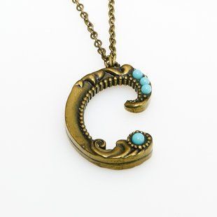 Кулон з латуні Michal Negrin у вигляді букви C з кристалами Swarovski 55450C фото